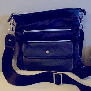 Chico’s NWOT BLACK crossbody, leopard lining, zippered, silver hardware.